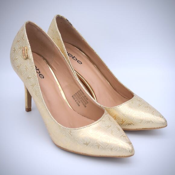Bebe Saydee Logo Pumps Heels 7.5 Gold Vegan Pointy Toe Shoes Stiletto Classic - Picture 1 of 7
